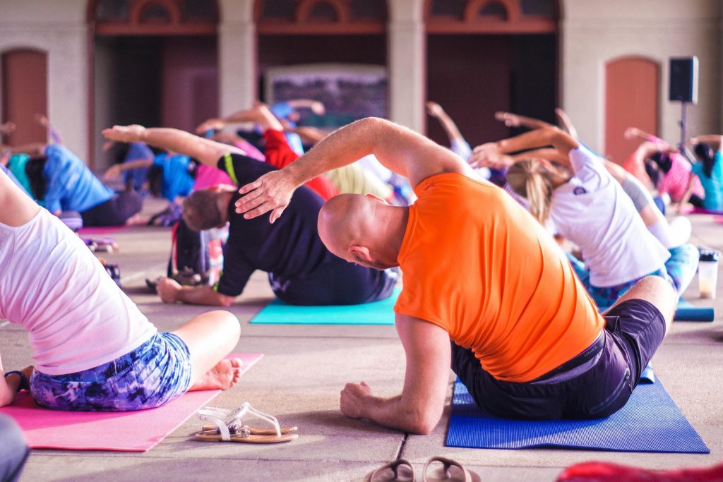 Physical Fitness News, people working out on exercise mat